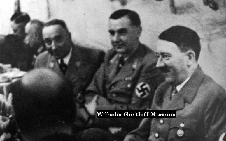 Adolf Hitler in the Wilhelm Gustloff's great hall with Bodo Lafferentz and Robert Ley